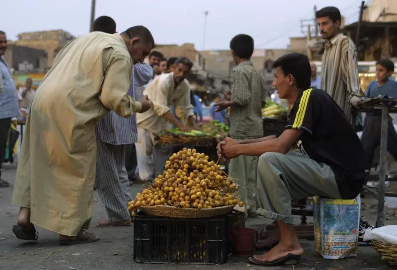 Baskets of fresh dates at a market stall in Basra